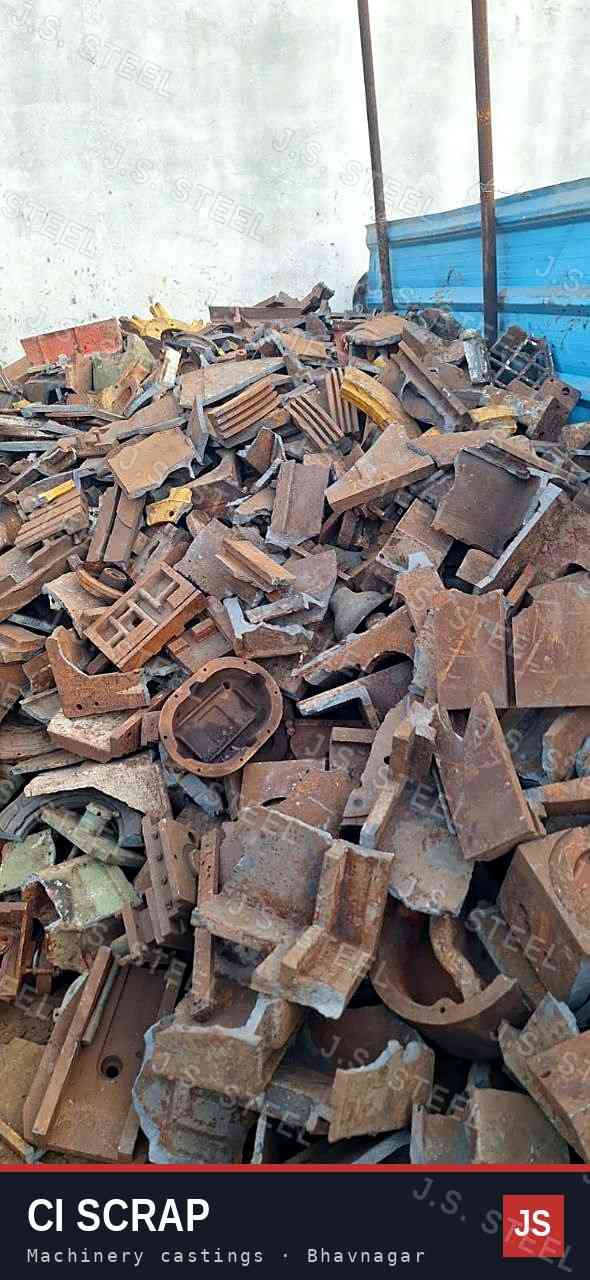 Wide view of a cast iron machinery scrap heap (CI scrap) at the J.S. STEEL yard, Bhavnagar