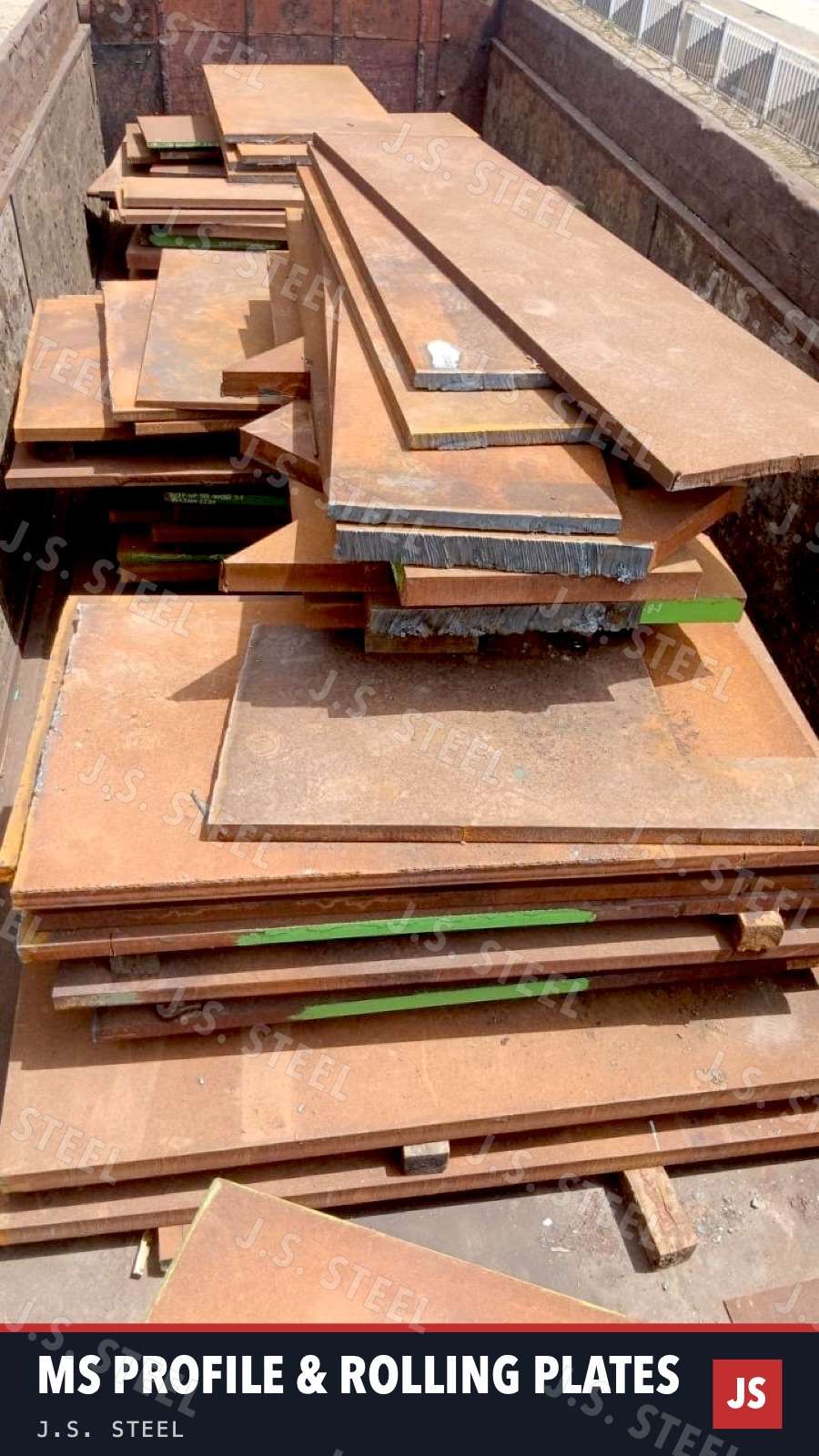 MS profile and rolling plates stacked in a truck at the J.S. STEEL yard, Bhavnagar