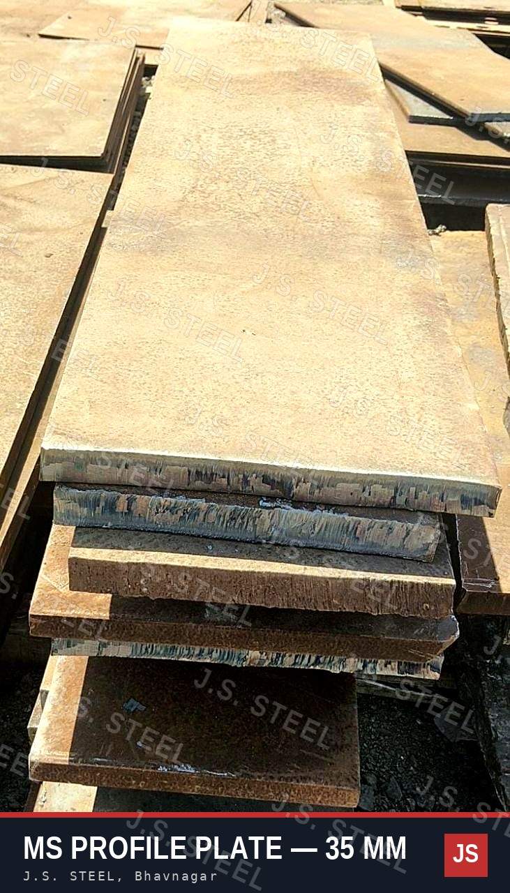 Stack of 35 mm MS profile plate strips, about 390 × 1540 mm, with gas-cut edges, at the J.S. STEEL yard, Bhavnagar