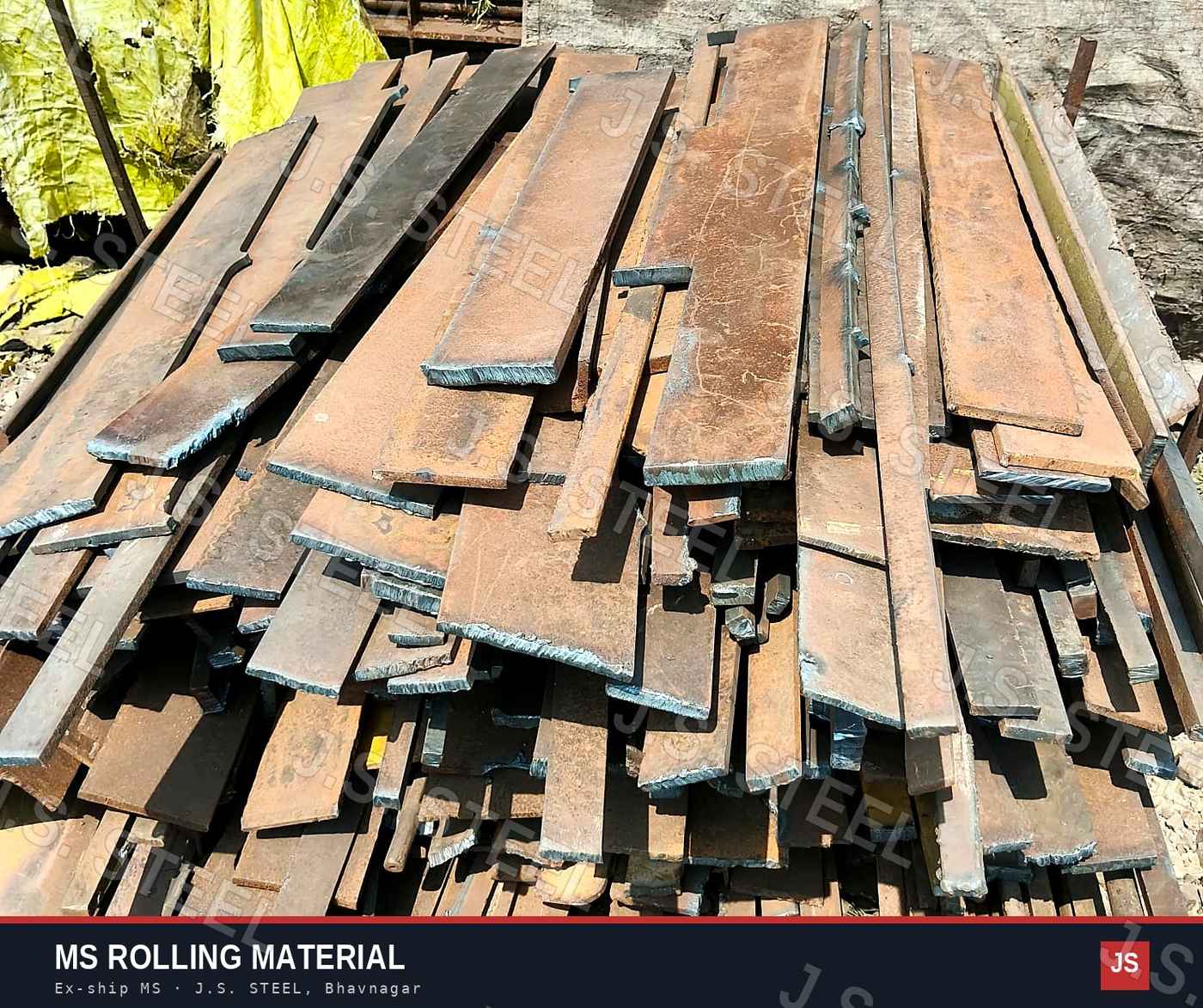 Pile of long ex-ship MS strips and flats for re-rolling mills at the J.S. STEEL yard, Bhavnagar