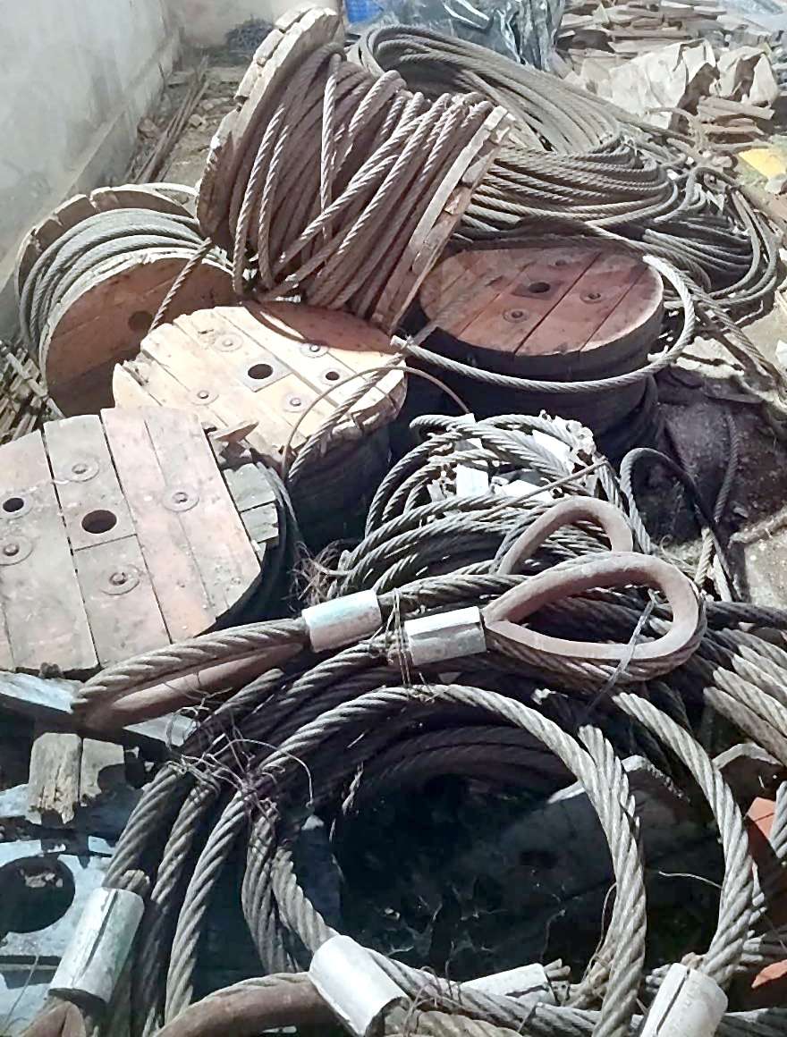 Used 32 mm galvanised steel wire rope on wooden reels and made-up wire rope slings with thimble eyes and pressed ferrules at the J.S. STEEL yard, Bhavnagar